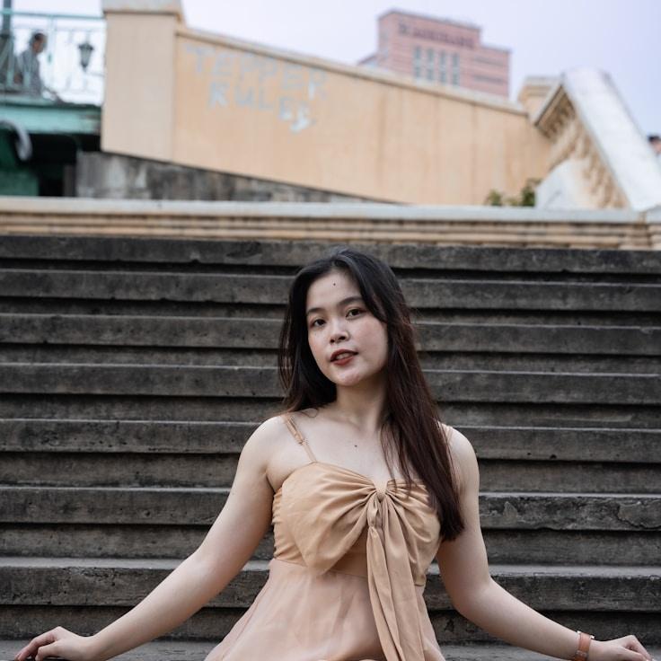 Amina Rao, Lead Design Curator at Orchid Patch Garden, reviewing corporate floral arrangements